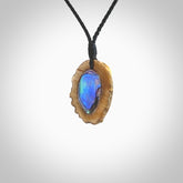 Hand carved deer antler Paua Shell Pendant. Made from Red Deer antler in New Zealand. Unique Pāua Shell necklace hand made from deer antler by master bone carver Fumio Noguchi. Spectacular collectable work of art, made to wear. One only pendant, delivered to you with express courier.